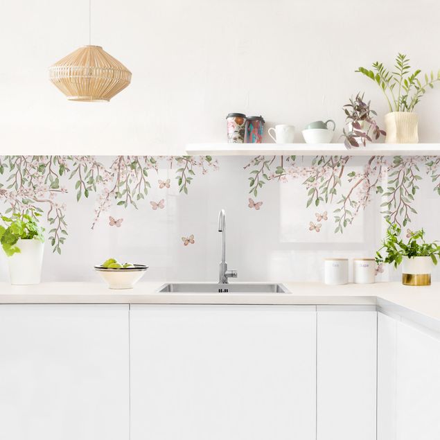 Spritzschutz Küche Glas Kirschblüte im Flügelspiel der Schmetterlinge