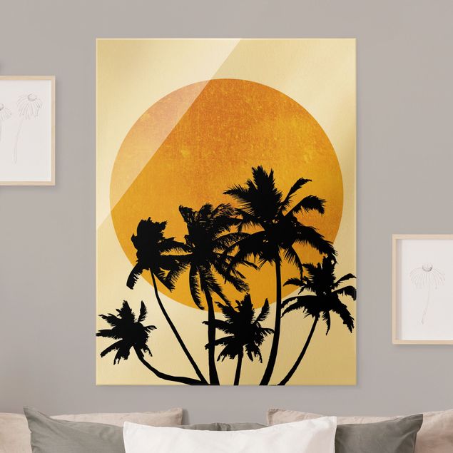 Glasbilder Sonnenuntergang am Meer Palmen vor goldener Sonne
