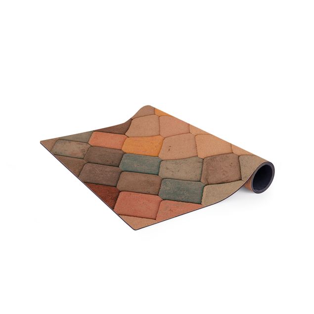Teppich bunt Pastellfarbene Fischschuppen aus Stein