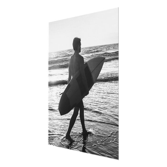 Glasbild schwarz-weiß Surferboy im Sonnenuntergang