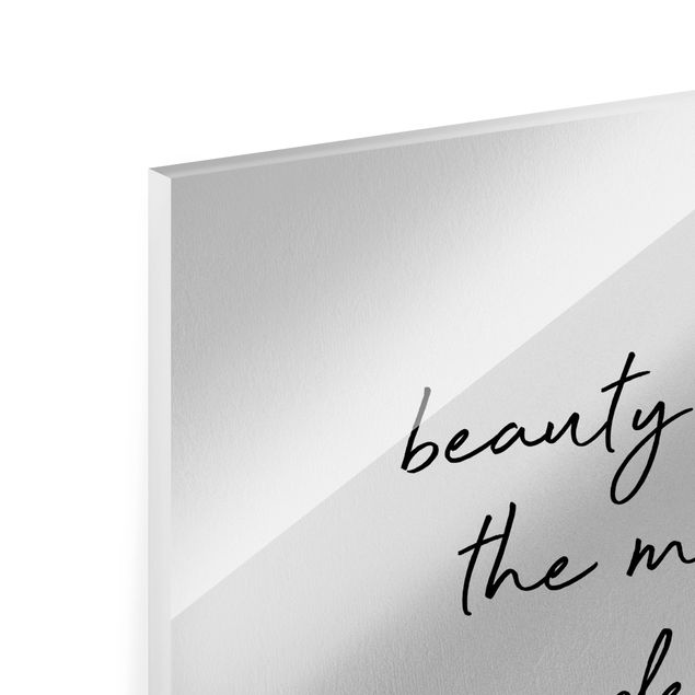 Bilder auf Glas Typografie Beauty Begins Zitat
