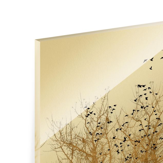Wandbilder Kunstdrucke Vogelschwarm vor goldenem Baum
