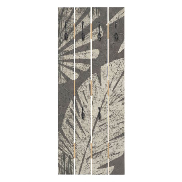 Wandgarderobe grau Palmenblätter vor Dunkelgrau